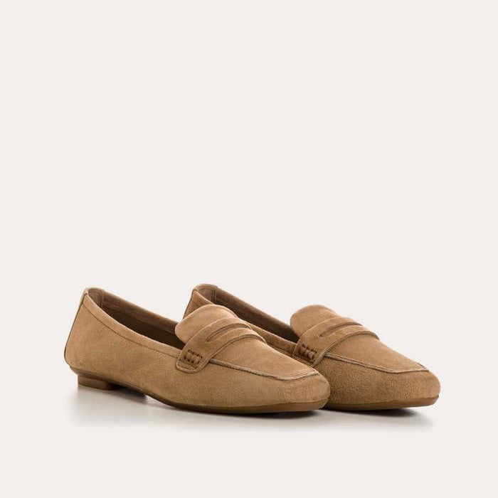 Top view of the REQINS - HEMA suede loafer in natural, featuring stitching details and a subtle branded leather insole, highlighting REQINS' craftsmanship against a plain white background.