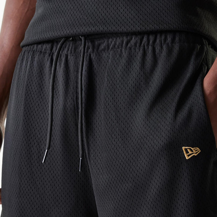 The Male model is wearing San Francisco 49ers NFL Mesh Black Shorts 5