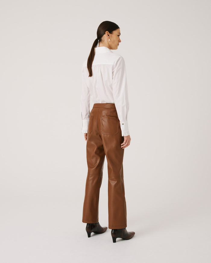 A solid dark gray rectangle with a slightly uneven texture. The color is consistent throughout, with no distinct patterns or shapes visible, reminiscent of the sleek finish on the SFIZIO - ECO LEATHER PANT made by SFIZIO in Italy.