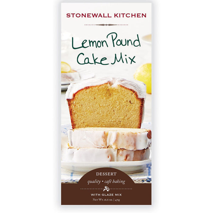 A package of STONEWALL KITCHEN - LEMON POUND CAKE MIX from Stonewall Kitchen showcases a tempting image of a glazed lemon pound cake with a slice cut and standing prominently in front. The packaging emphasizes the dessert's tangy lemon glaze, making it an ideal treat. The net weight is 16.6 oz (470 grams).