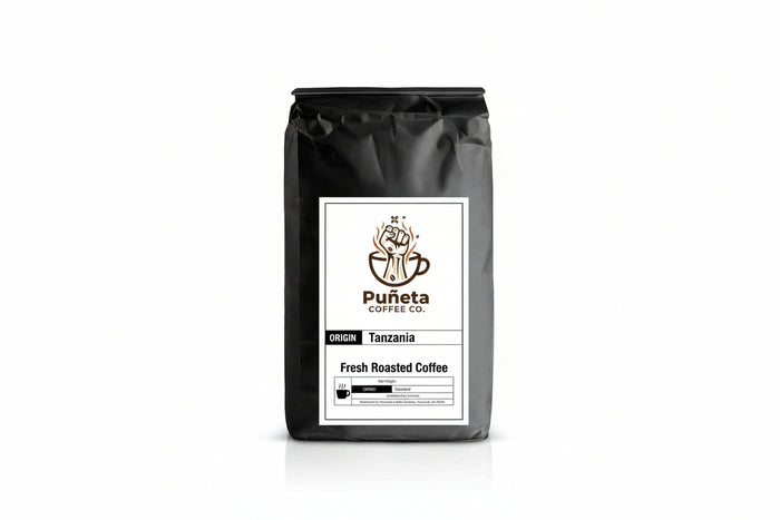 Black coffee bag with Puánta Coffee Co. label