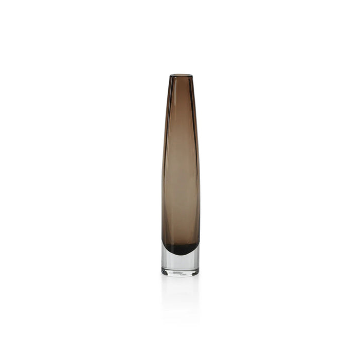 The ZODAX TATE SLIM GLASS TAUPE VASE - SHORT features a cylindrical taupe glass body with a clear base, measures 2.5" x 13.5", and is displayed against a plain white background.