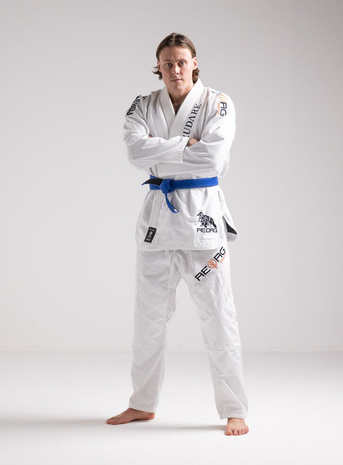 Angus Is 6ft 4" | Hem Studio Image Of Model Wearing Thrudark X Reorg Lightweight Nqg Gi In White (SS Model)