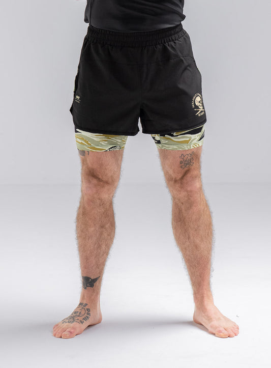 Staz Is 5ft 8" And Wears Size: S | Hem Studio Image Of Model Wearing Thrudark X Scramble No Gi Shorts In Obsidian Black (SS Model)