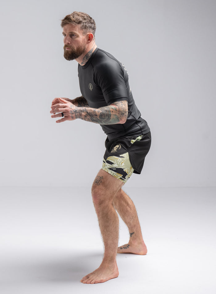 Staz Is 5ft 8" And Wears Size: S | Hem Studio Image Of Model Wearing Thrudark X Scramble No Gi Shorts In Obsidian Black (SS Model)