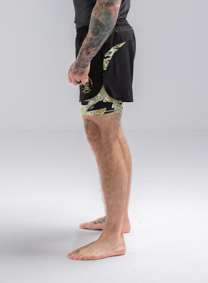 Staz Is 5ft 8" And Wears Size: S | Hem Studio Image Of Model Wearing Thrudark X Scramble No Gi Shorts In Obsidian Black (SS Model)
