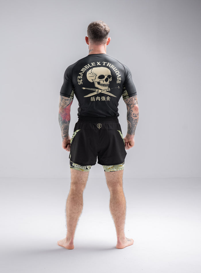 Staz Is 5ft 8" And Wears Size: S | Hem Studio Image Of Model Wearing Thrudark X Scramble No Gi Shorts In Obsidian Black (SS Model)
