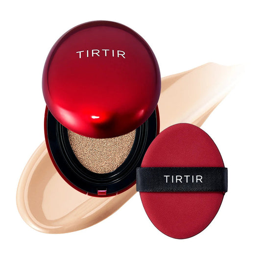 A TIRTIR Mask Fit Red Cushion Foundation in Ivory by KOSMIC KBEAUTY SKINCARE is shown open in its red compact, with a beige cushion foundation inside, an applicator puff beside it, and a swatch of the hydrating full coverage formula in the background.