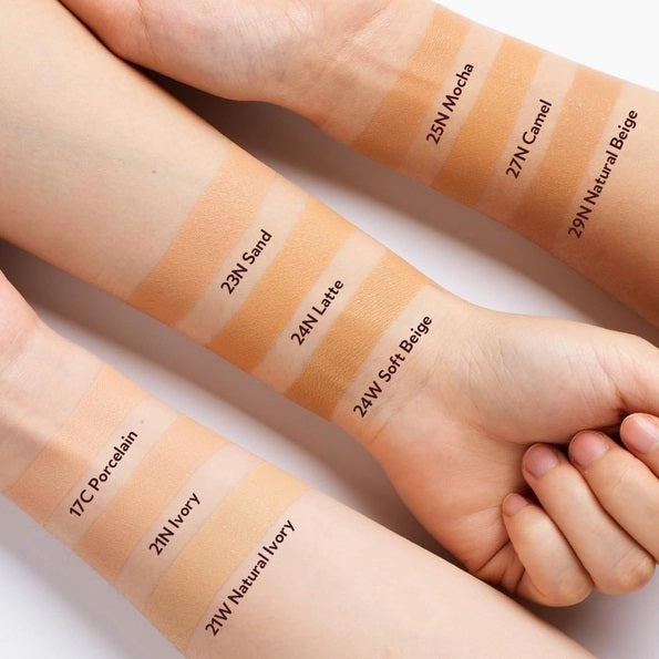 A red compact labeled "TIRTIR - MASK FIT RED CUSHION FOUNDATION IN MOCHA" by KOSMIC KBEAUTY SKINCARE opens to reveal a matching puff with a black TIRTIR band, set against a beige swipe that highlights its hydrating, long-lasting coverage.