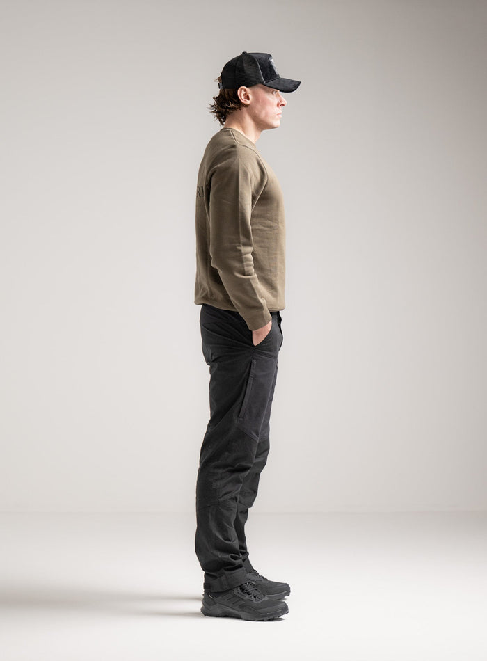 Rudie Is 6ft 2" And Wears Size: M | Hem Studio Image Of Model Wearing Vader Jumper - Originals In Khaki (SS Model)