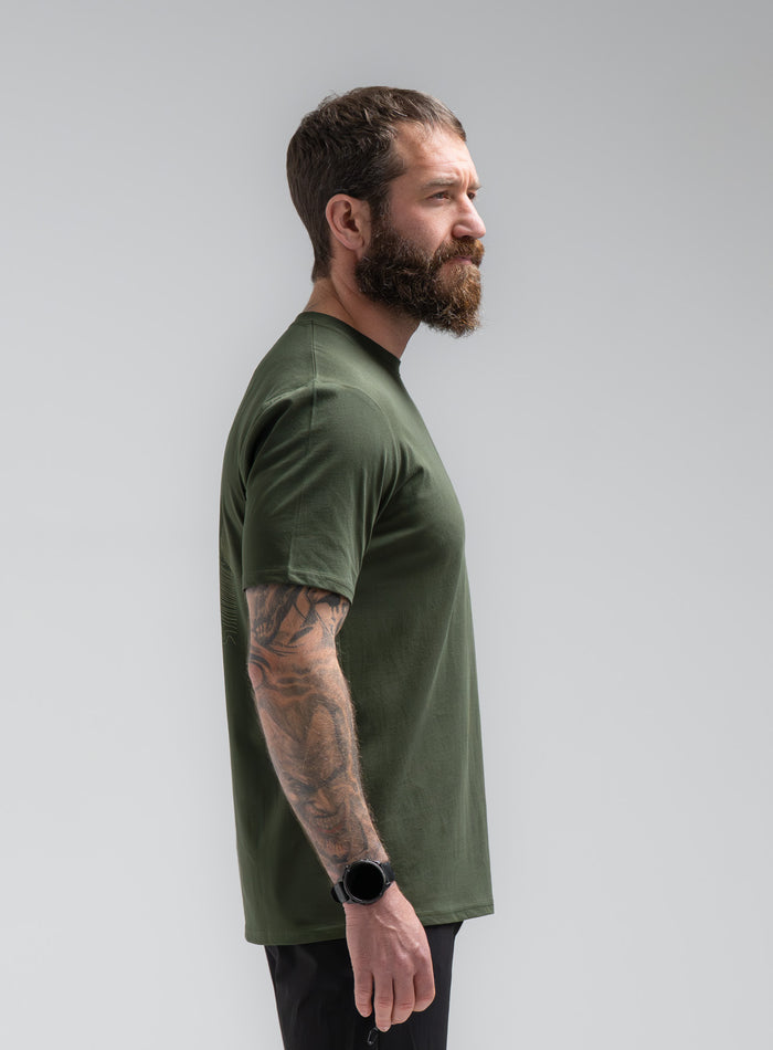 Louis Is 5ft 10" And Wears Size: M | Hem Studio Image Of Model Wearing Vader T-Shirt - Pen Y Fan In Forest Green (SS Model)