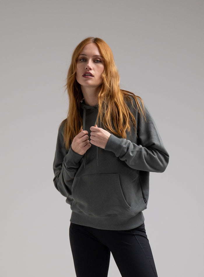 Miki Is 5ft 8" And Wears Size: S | Hem Studio Image Of Model Wearing Valor Hoody In Urban Green (SS Model)
