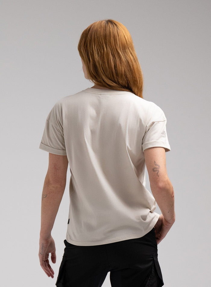 Miki Is 5ft 8" And Wears Size: S | Hem Studio Image Of Model Wearing Valor T-Shirt In Stone (SS Model)